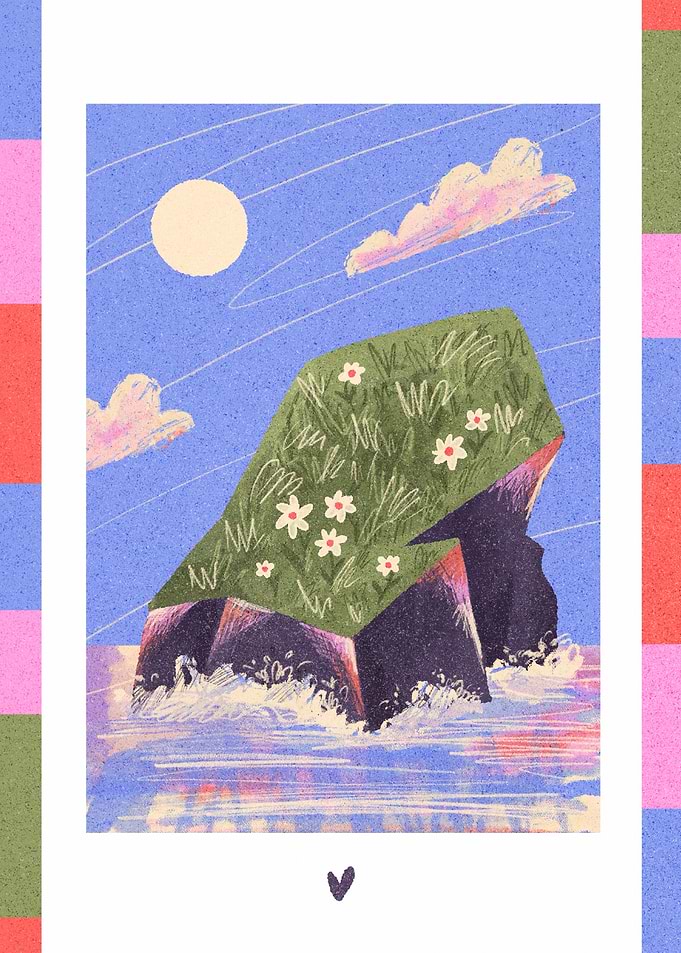Island rock with flowers and ocean