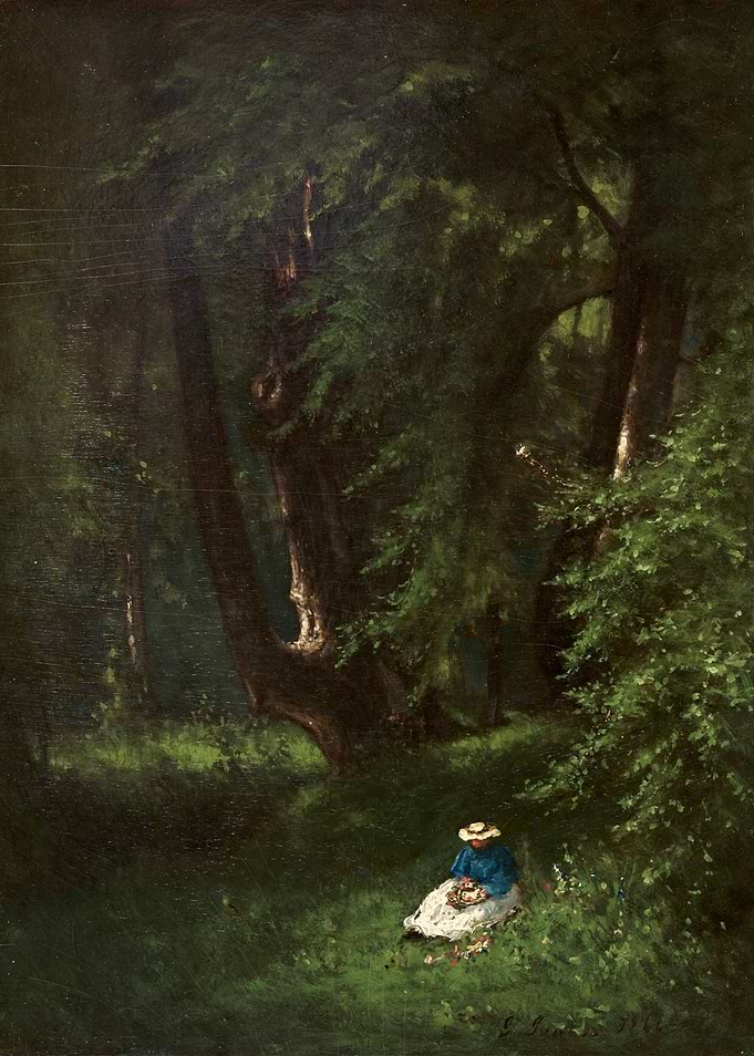 Woman in a forest gathering flowers