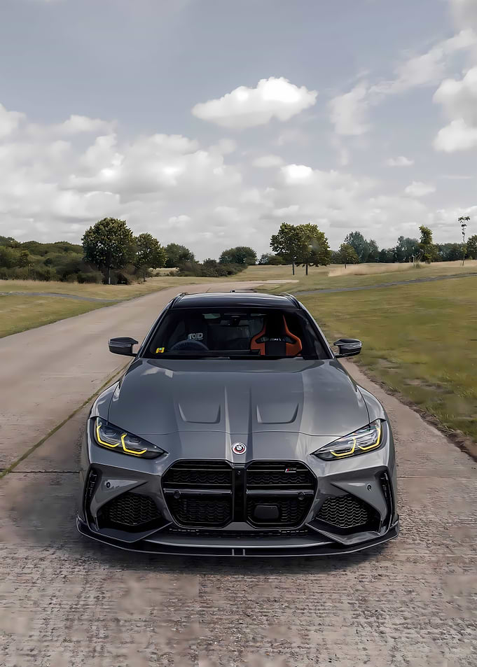 Gray BMW M4 on a Road