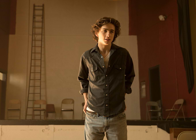Timothée Chalamet in a dark shirt