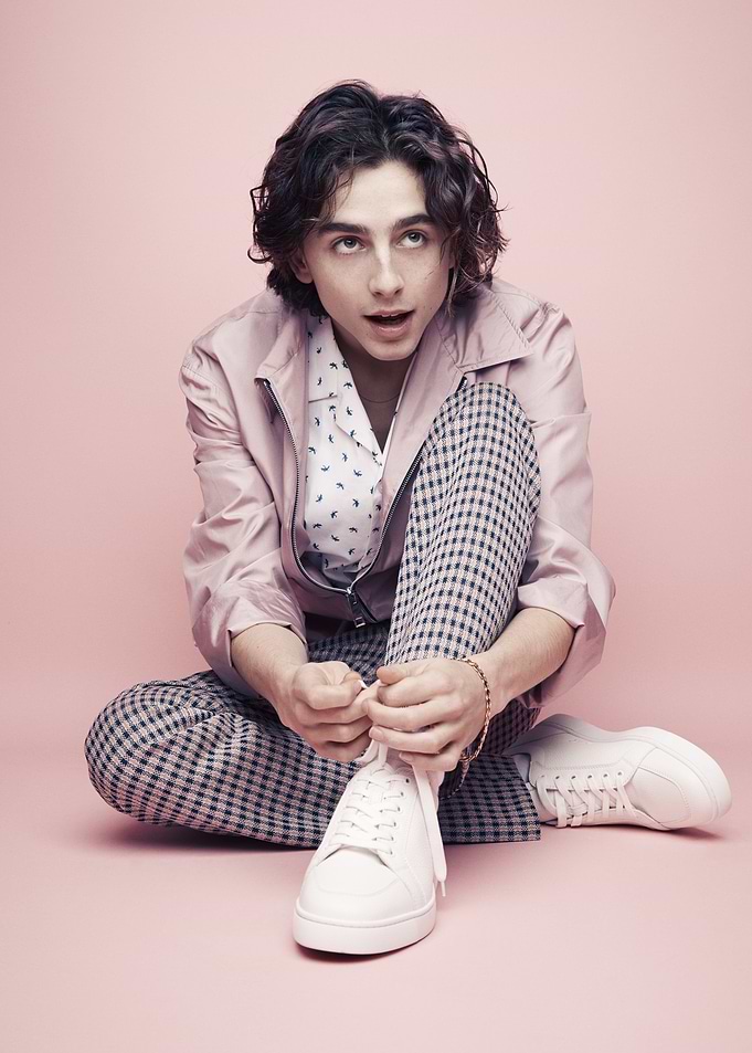 Timothée Chalamet tying shoelaces