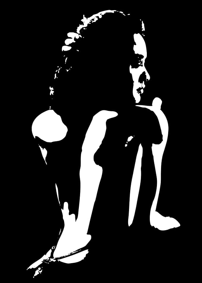 Silhouette of a woman in a crouched pose