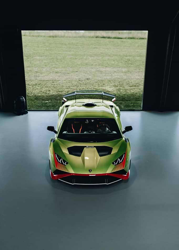 Green Lamborghini Supercar in Hangar
