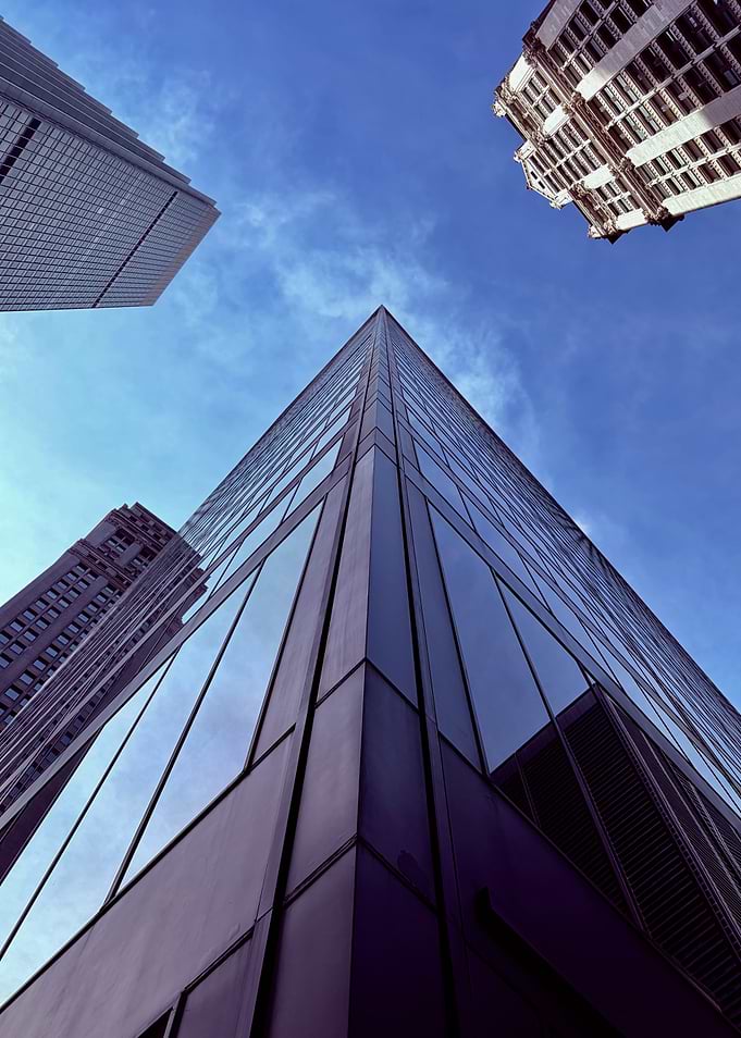 Modern City Skyscrapers Against Blue Sky