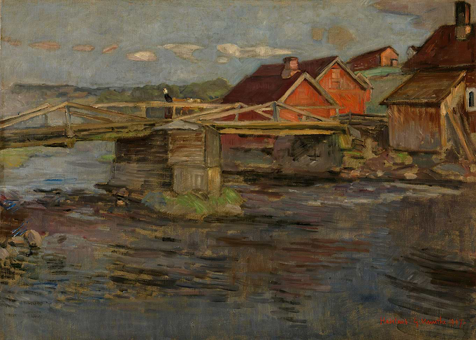 Bridge over a river with red houses