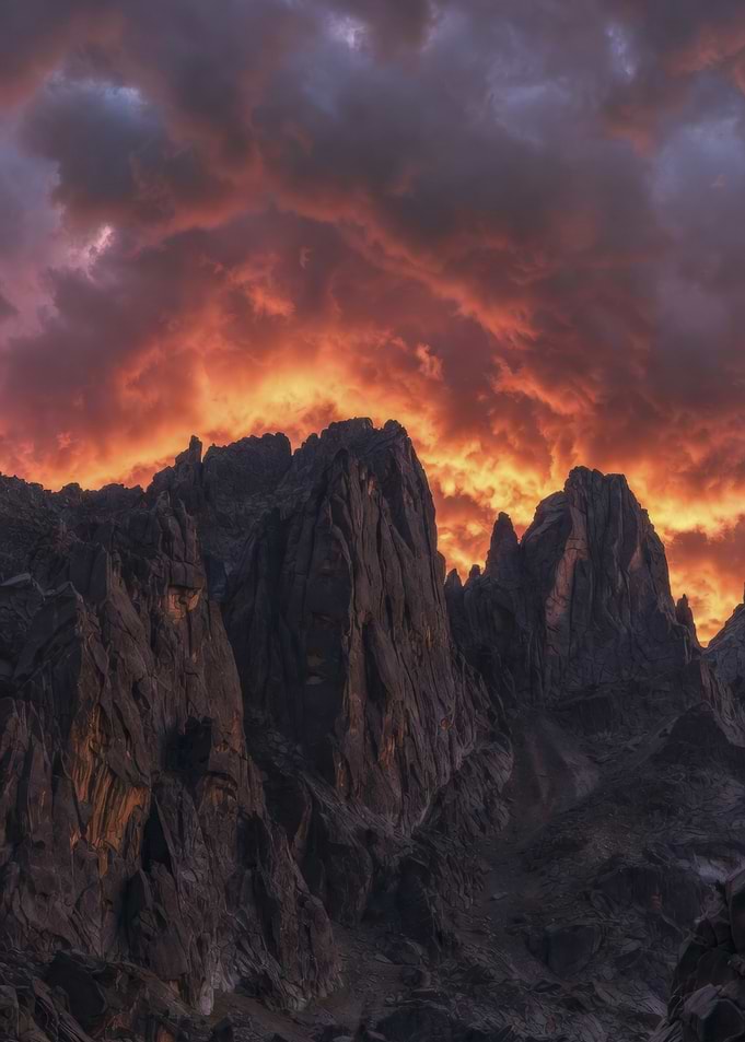 Dramatic Sunset Over Jagged Mountains