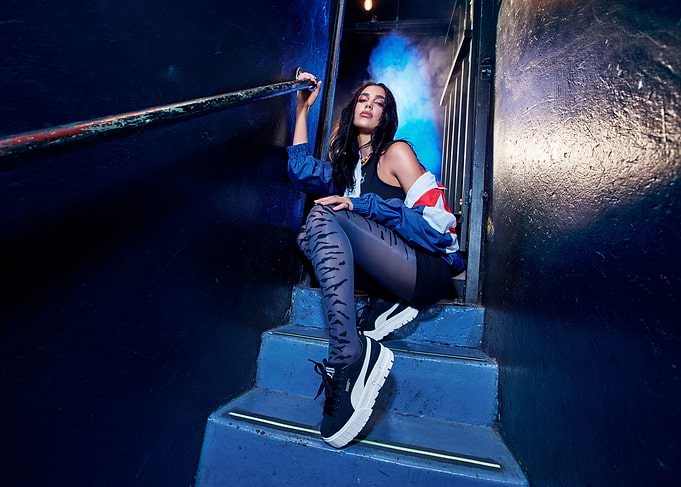 Woman in athletic wear on stairs
