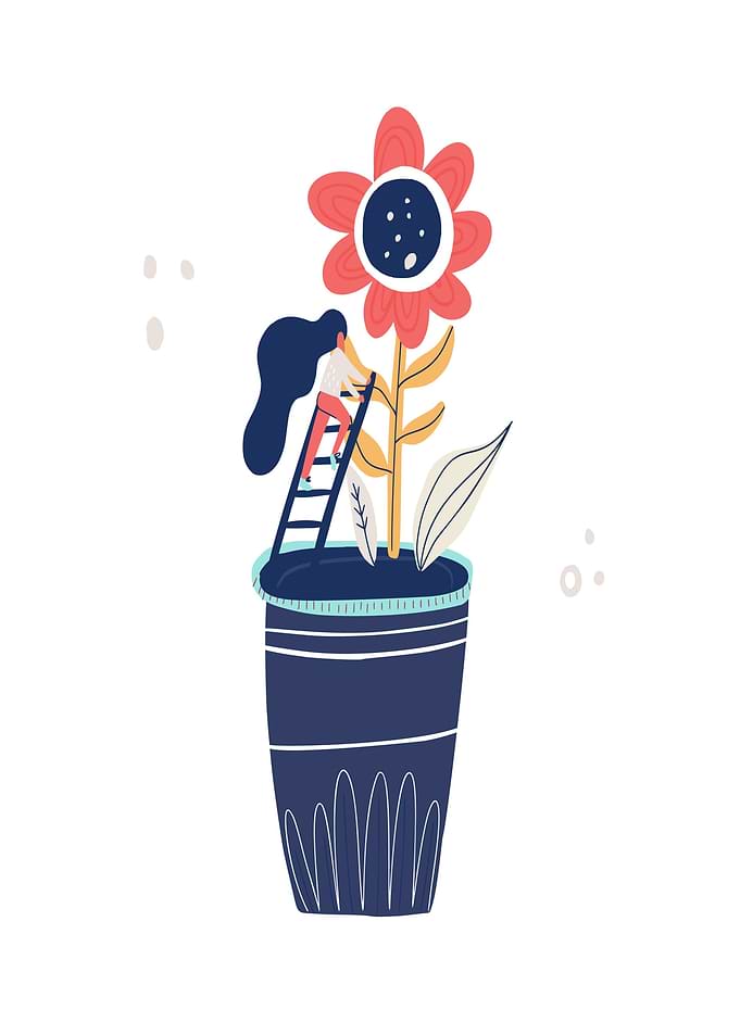 Woman tending to a large flower