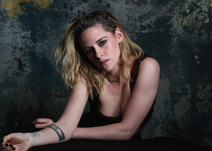 Kristen Stewart Posing Against Textured Background