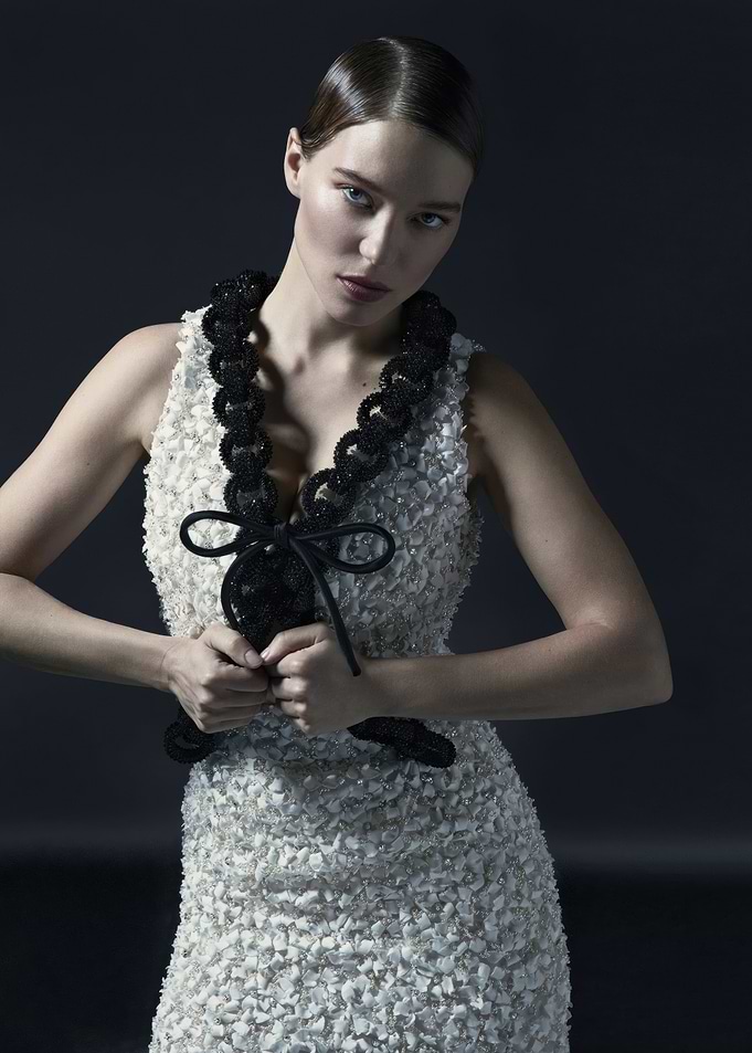 lea seydoux in textured dress with black trim