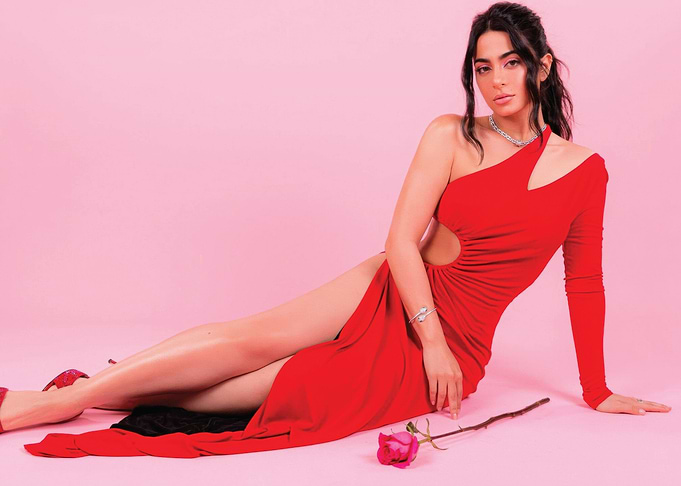 emeraude toubia in Red Dress with Rose