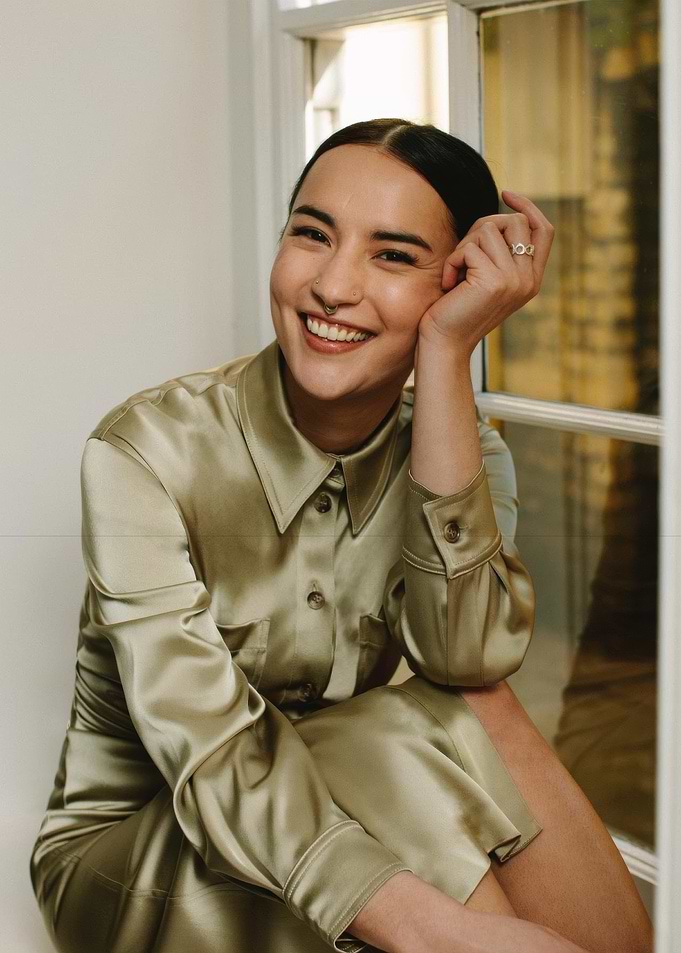 jessie mei li in satin shirt by window