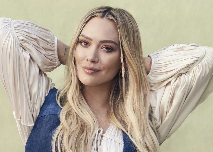 Hilary Duff Posing with Hands Behind Head