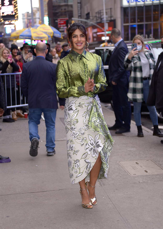 Priyanka Chopra Jonas in a floral skirt and green shirt
