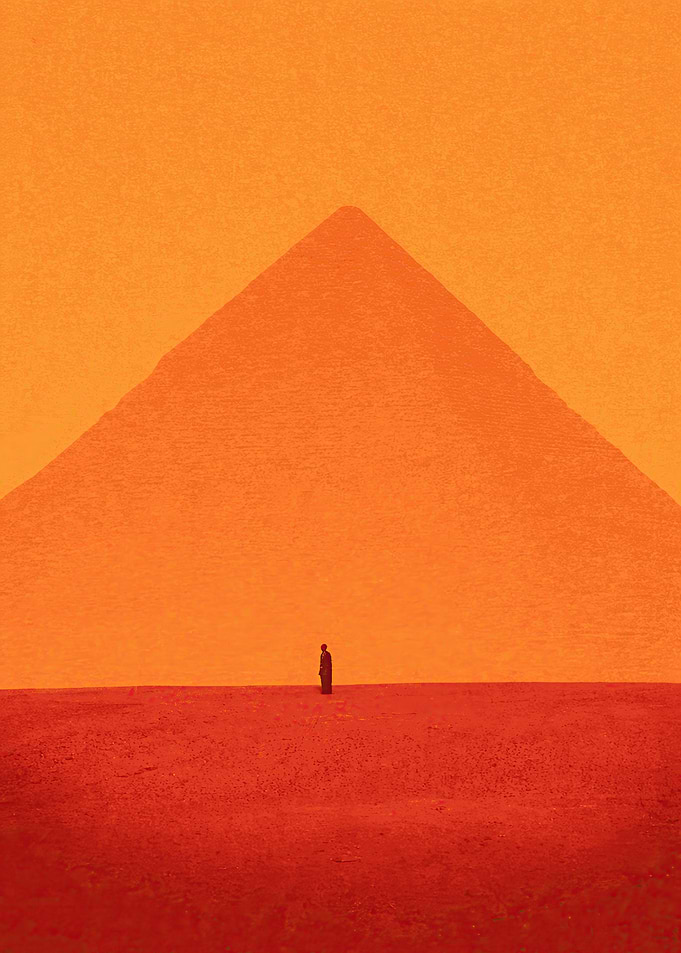 Lone figure before a pyramid