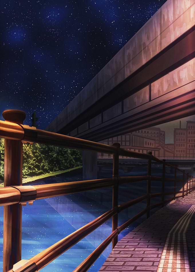 Nighttime cityscape with bridge and river