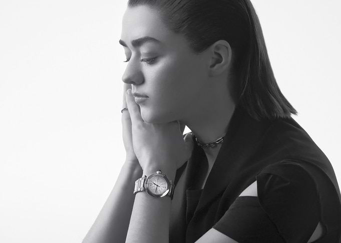 Maisie Williams wearing watch and necklace