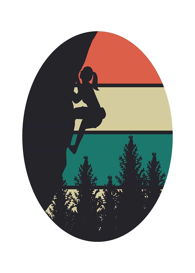 Silhouette of a woman rock climbing