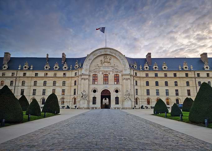 Grand Building Facade with Cobblestone Path