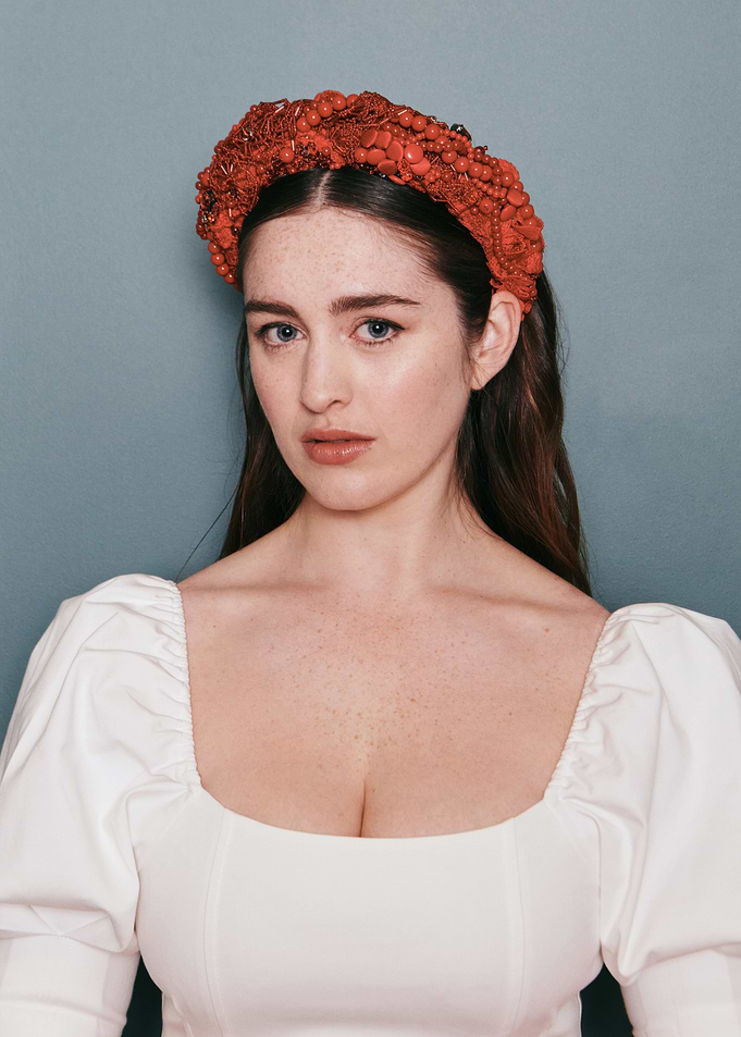 danielle galligan with Red Headband and White Dress
