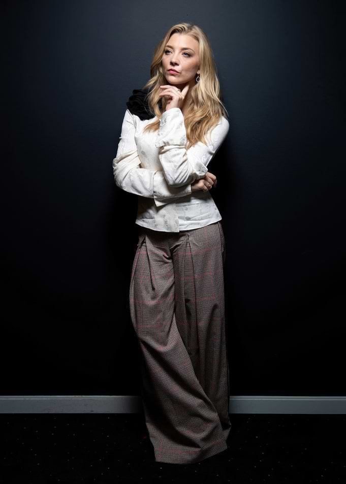 Natalie Dormer Posing Against Dark Background