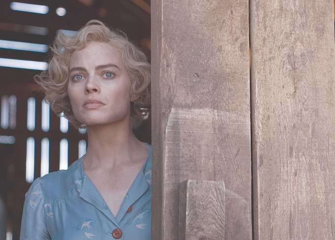 Margot Robbie in a blue dress