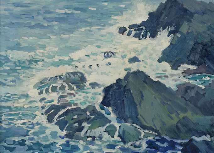 Waves crashing on rocky shore