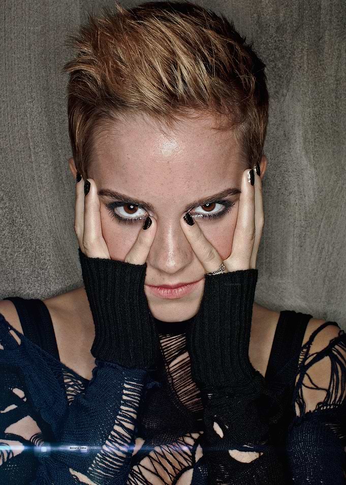 Emma Watson with hands covering face