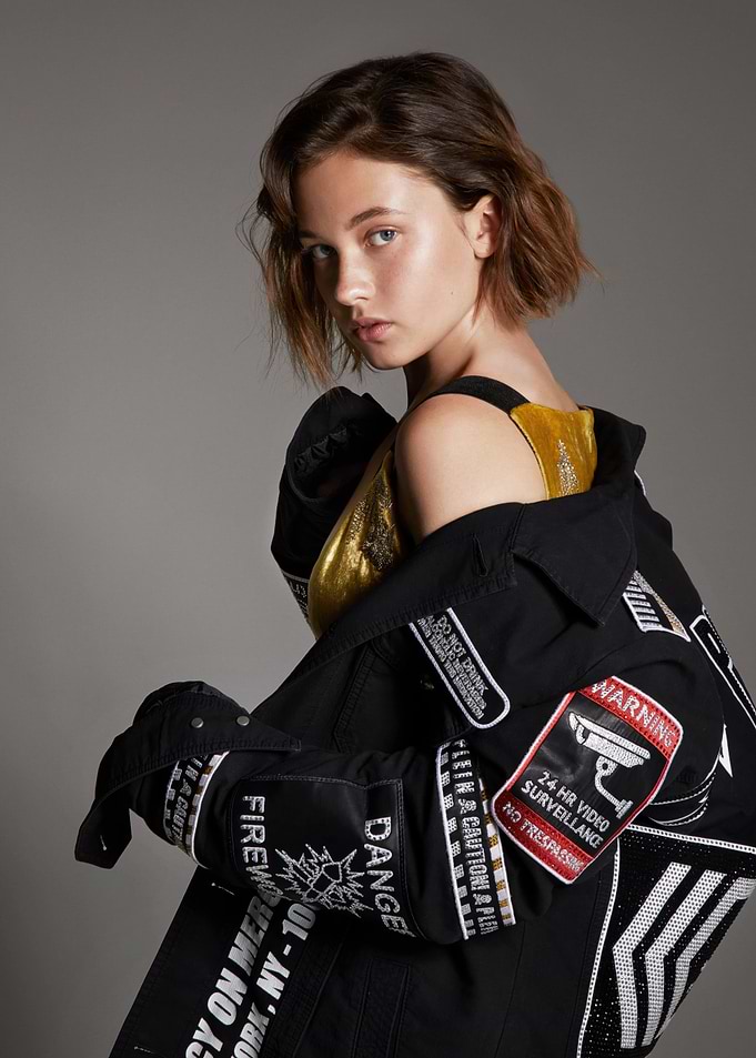 Cailee Spaeny in a decorated denim jacket