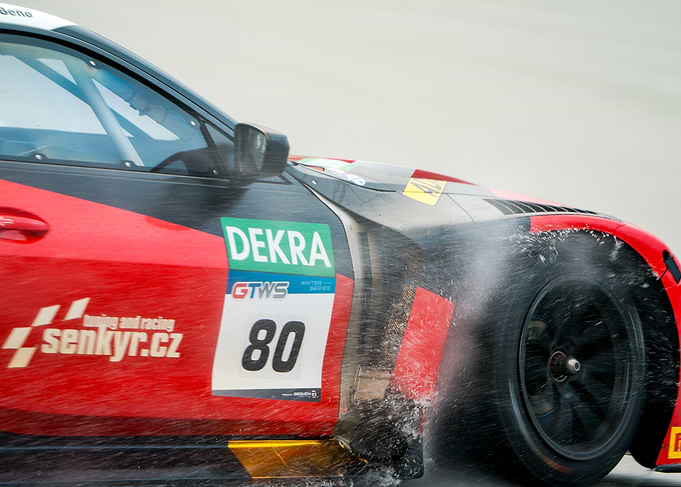 Race Car Driving Through Water