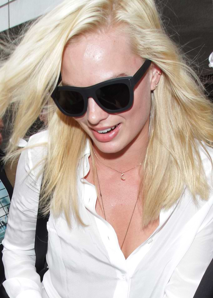 Margot Robbie Wearing Sunglasses and Necklace