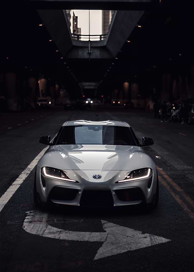 White Toyota Supra on City Street