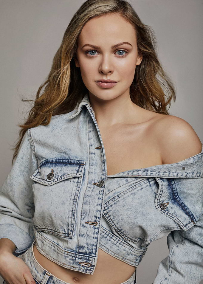 Meghan Roberts in Acid Wash Denim Jacket