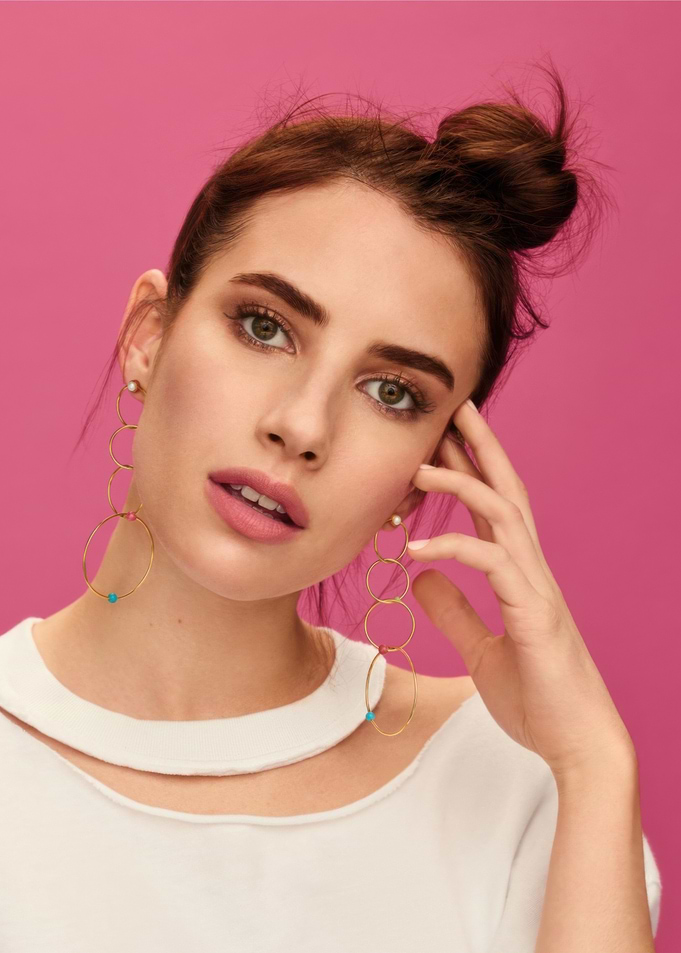 Emma Roberts with long dangling earrings