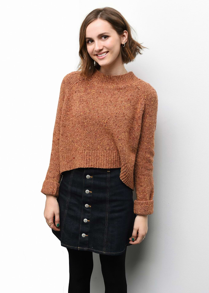 Maude Apatow in Sweater and Denim Skirt