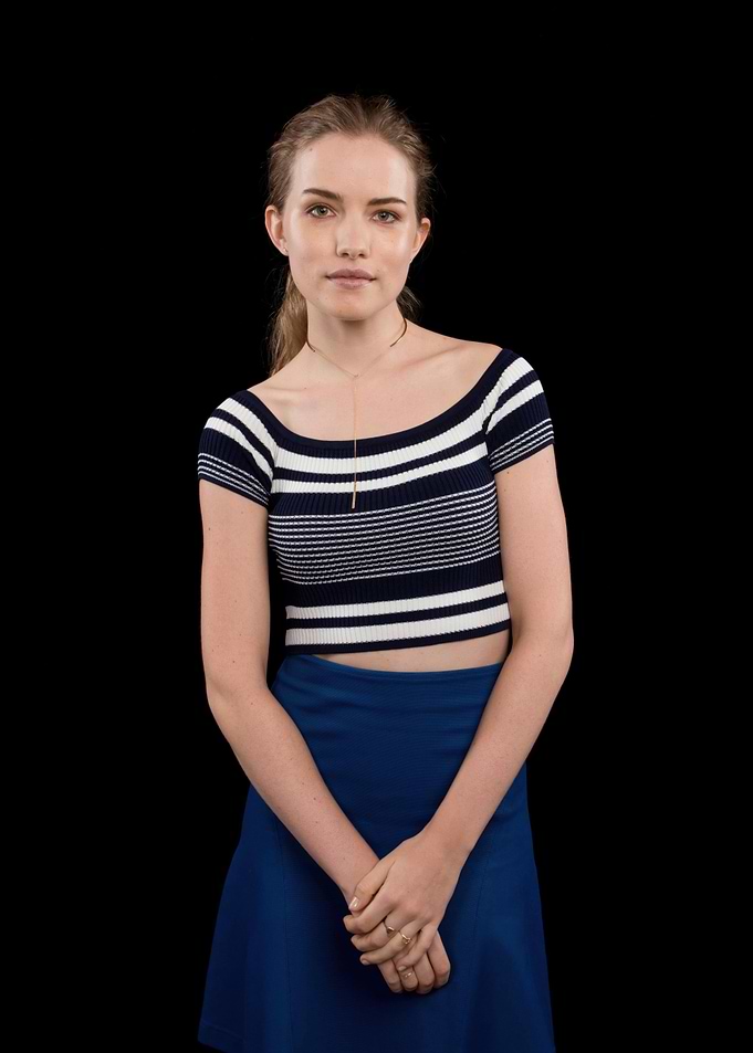 Willa Fitzgerald in striped crop top and blue skirt