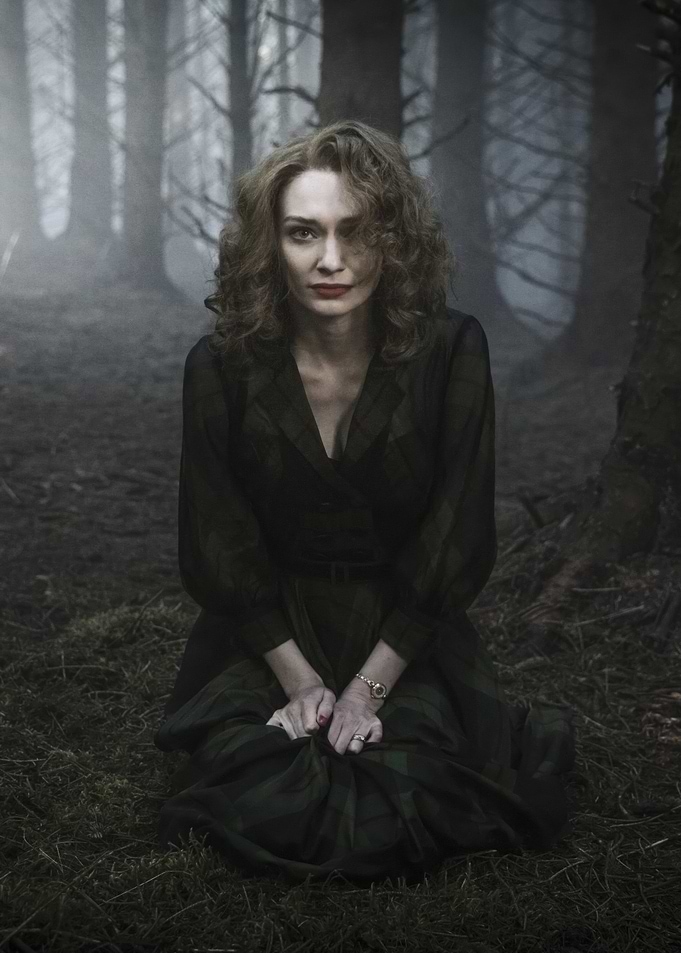 Eleanor Tomlinson in a dark forest