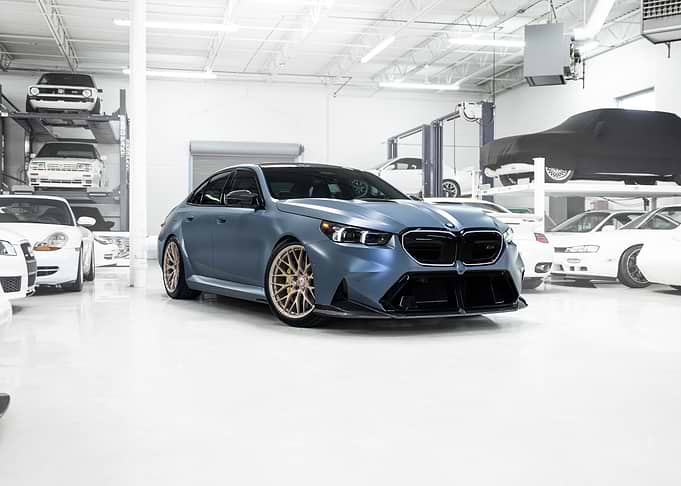 Custom Blue BMW Sedan in Garage