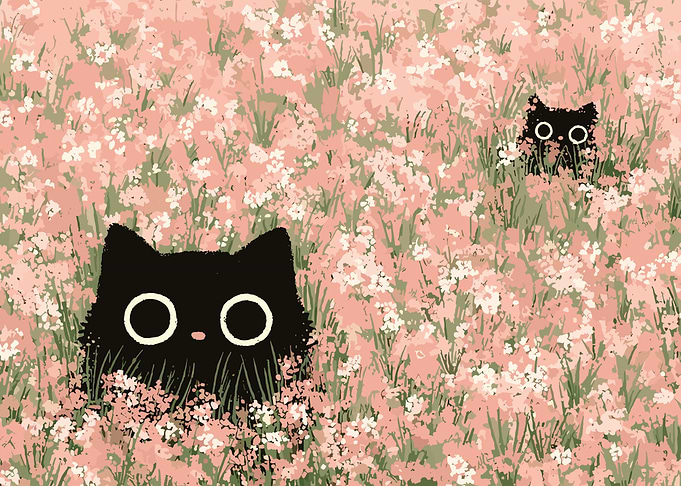 Two black cats in a field of flowers