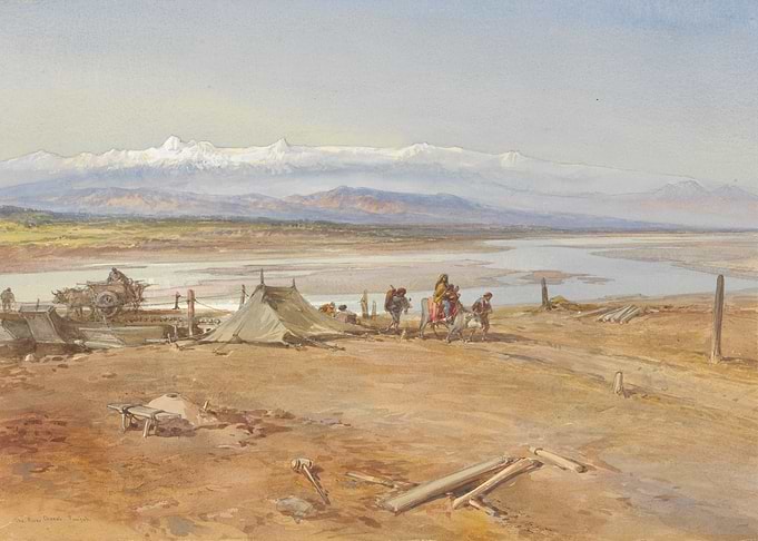 Caravan crossing a river with mountains in background