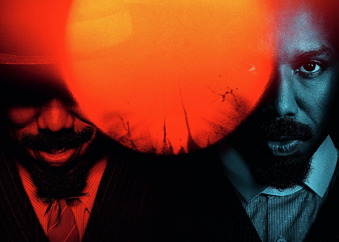 Two men in dramatic lighting