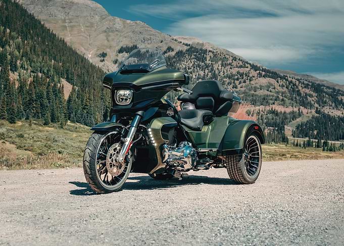 Green Harley-Davidson Trike in Mountains