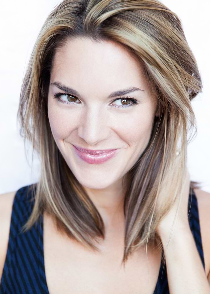 Kelli Barrett with blonde and brown hair smiling