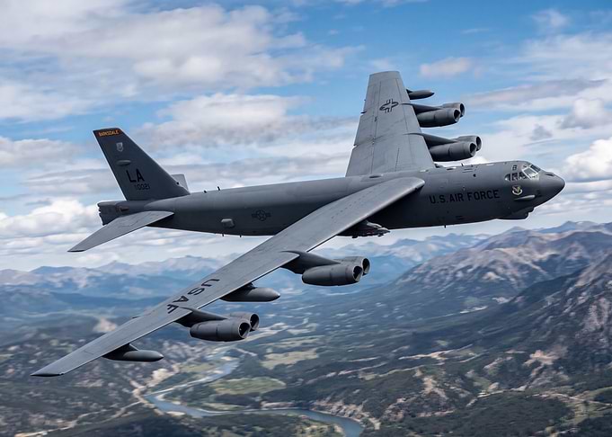 US Air Force B-52 Bomber Flying Over Mountains