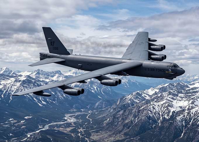 B-52 Bomber Over Mountains
