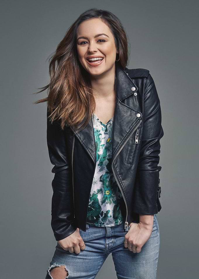 Hayley Orrantia in Leather Jacket and Jeans