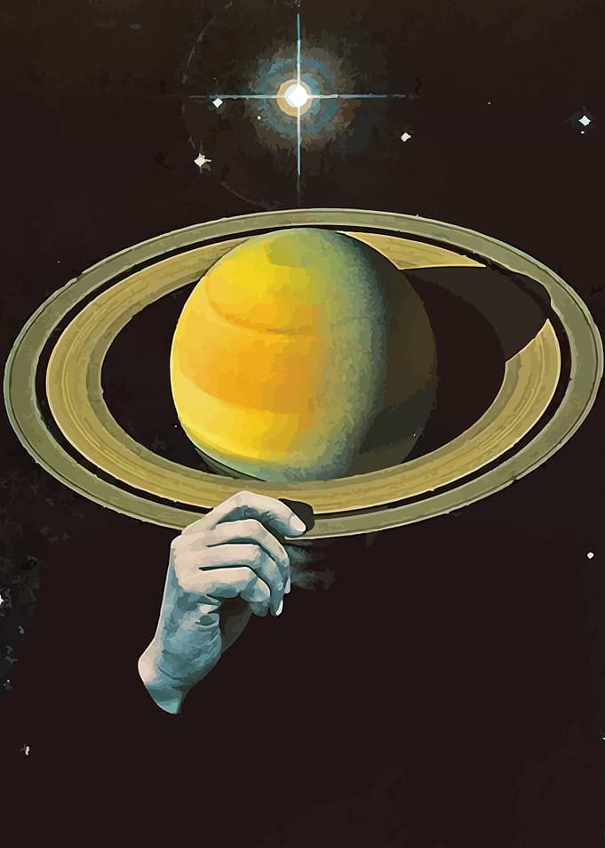 Hand holding Saturn in space
