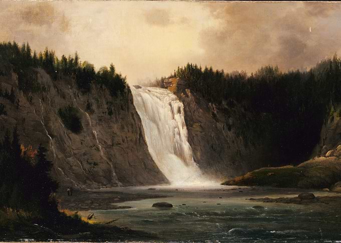 Majestic Waterfall in a Forested Canyon