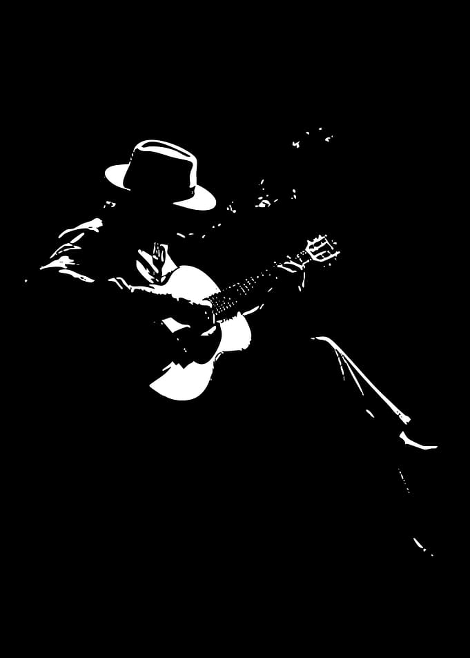 Musician Playing Guitar in Silhouette