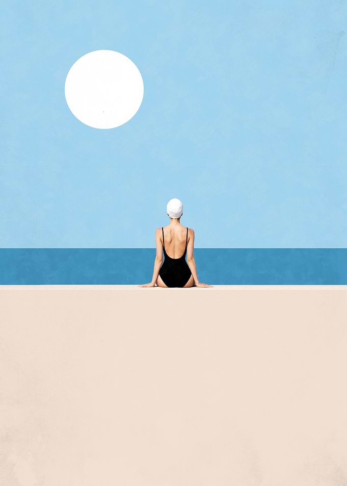 Woman in swimsuit by the sea